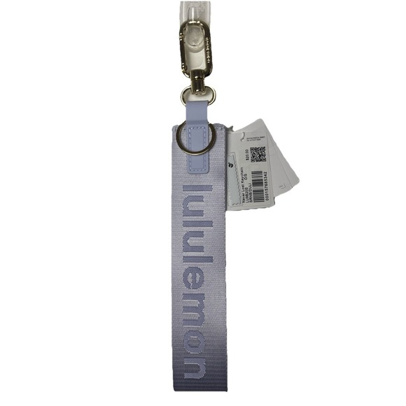 lululemon athletica Accessories - Lululemon Never Lost Keychain In Serene Blue/Dusty Lilac W/Gold Hardware NWT